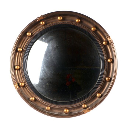 1064 - A Regency style convex mirror, 41cms diameter.