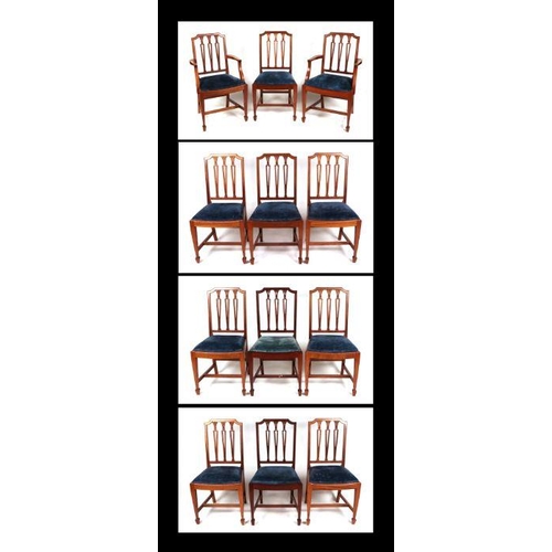 1067 - A set of twelve late 19th / early 20th century Hepplewhite Revival mahogany dining chairs with pierc... 