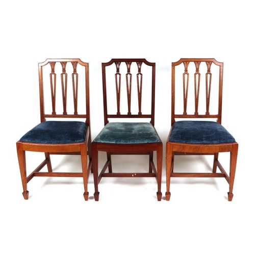 1067 - A set of twelve late 19th / early 20th century Hepplewhite Revival mahogany dining chairs with pierc... 