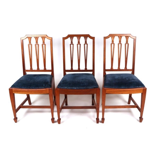 1067 - A set of twelve late 19th / early 20th century Hepplewhite Revival mahogany dining chairs with pierc... 