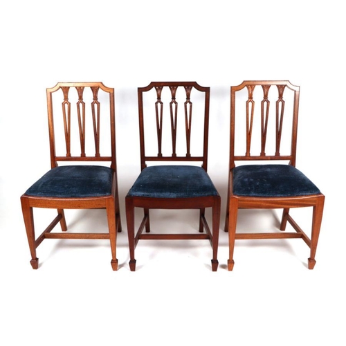 1067 - A set of twelve late 19th / early 20th century Hepplewhite Revival mahogany dining chairs with pierc... 