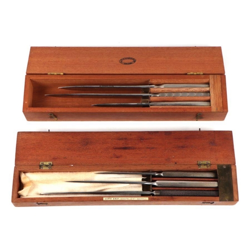 107 - A set of three 19th century Down Brothers, London, surgeons knives,cased; together with another simi... 