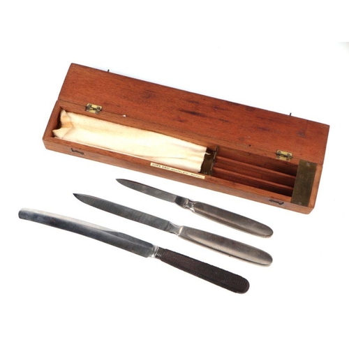 107 - A set of three 19th century Down Brothers, London, surgeons knives,cased; together with another simi... 