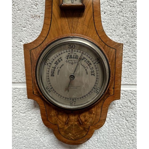 111 - A John Barker & Co. of Kensington barometer thermometer in a walnut case, 55cms high.