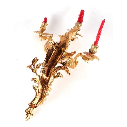 119 - A set of three rococo style gilt metal wall sconces, each approx 50cms high (3).