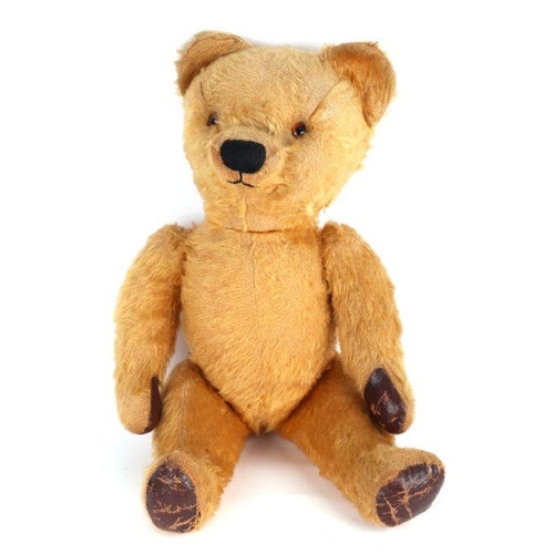 129 - A vintage plush jointed teddy bear, 43cms high.