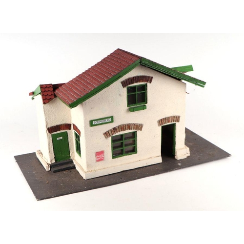 158 - A quantity of assorted 'G' gauge trackside buildings to include a signal box, train station, water b... 