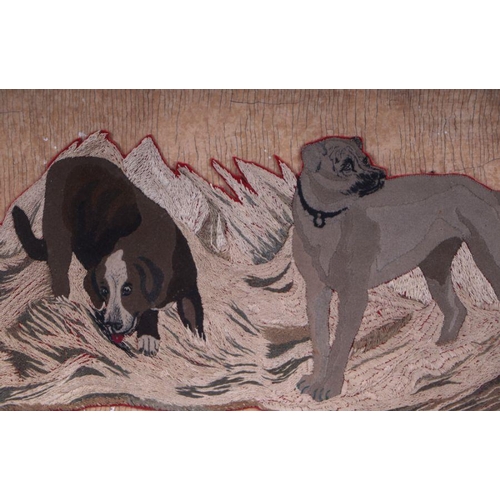 166 - A 19th century embroidered feltwork depicting two dogs standing in a stream, framed & glazed, 46... 