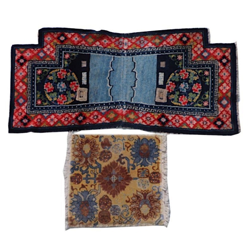 174 - A Tibetan saddle blanket; together with three Tibetan hand knotted meditation rugs, the largest 88 b... 