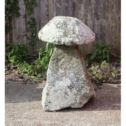 19 - A well weathered staddle stone, 78cms high.