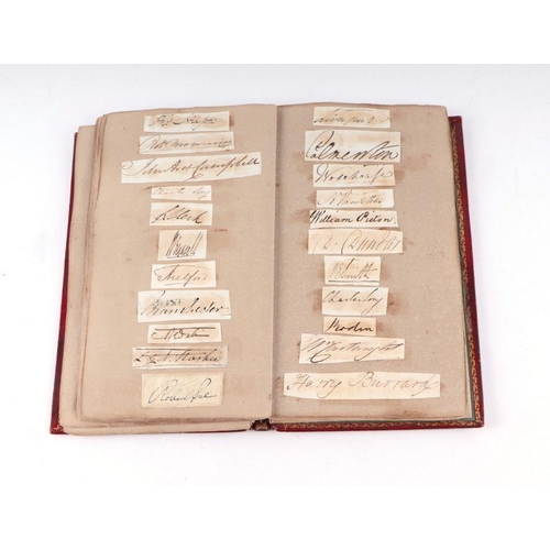 27 - An early 19th century tooled red leather album containing family silhouettes and numerous signatures... 