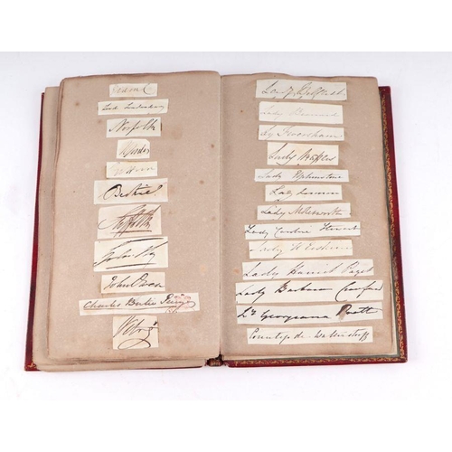 27 - An early 19th century tooled red leather album containing family silhouettes and numerous signatures... 