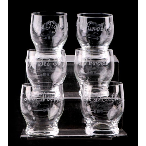 283 - Sporting interest:  A set of six glass tumblers, each engraved with cock fighting scenes, The Set To... 