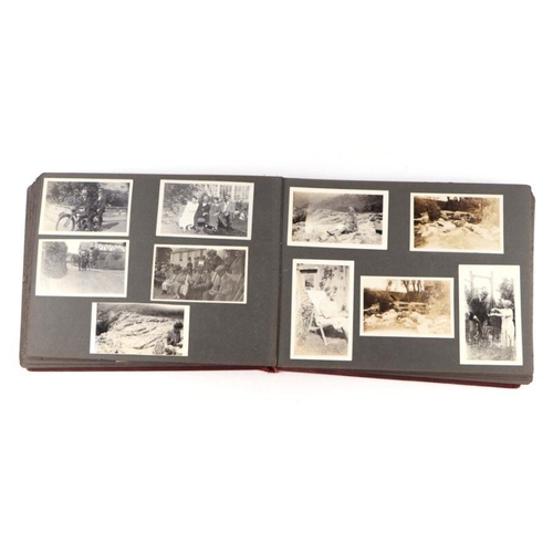 29 - An early 20th century family photograph album depicting travels and motor vehicles.