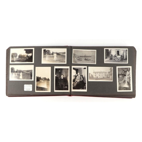 29 - An early 20th century family photograph album depicting travels and motor vehicles.