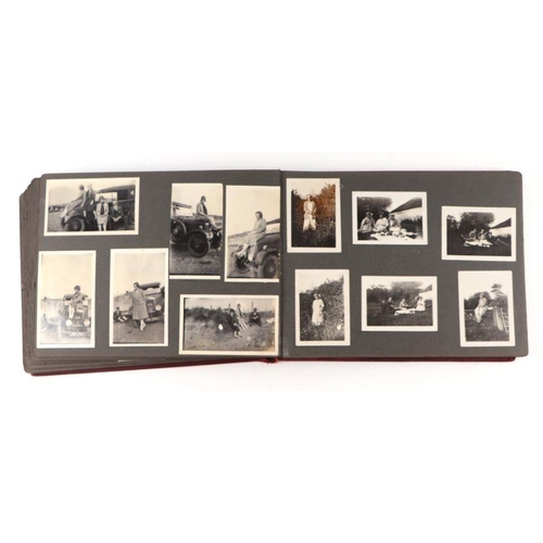 29 - An early 20th century family photograph album depicting travels and motor vehicles.