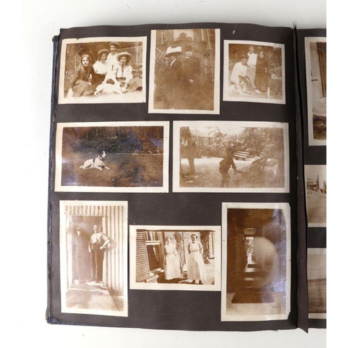 43 - An early 20th century family photo album depicting images of cars, military, topographical subjects ... 