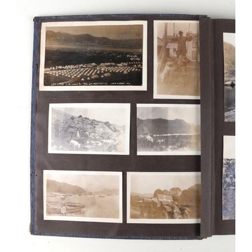 43 - An early 20th century family photo album depicting images of cars, military, topographical subjects ... 