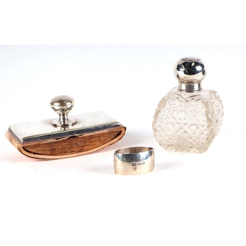 511 - A George V silver and cut glass scent bottle, Birmingham 1907, 13cms high; together with a continent... 