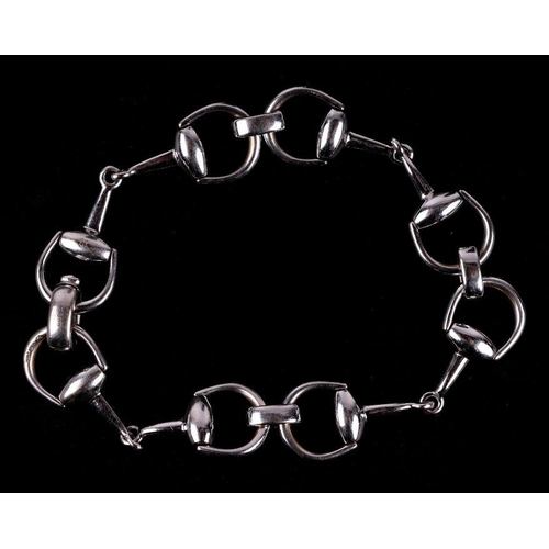 519 - A Gucci 18ct white gold stirrup bracelet, 23g, 20cms long.