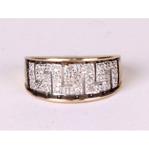 528 - A 9ct gold diamond set dress ring, approx UK size 'L', 2.9g.