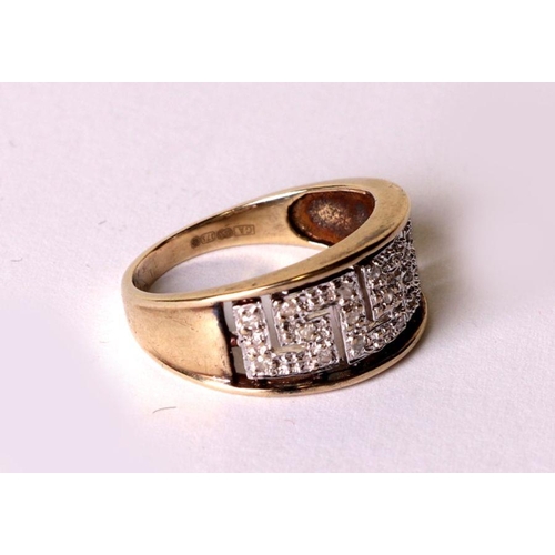 528 - A 9ct gold diamond set dress ring, approx UK size 'L', 2.9g.