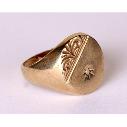 532 - A gentleman's 9ct gold diamond set signet ring, approx UK size 'V', 5g.