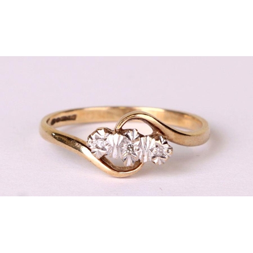 535 - A 9ct gold three stone diamond ring, approx UK size 'N', 1.4g.