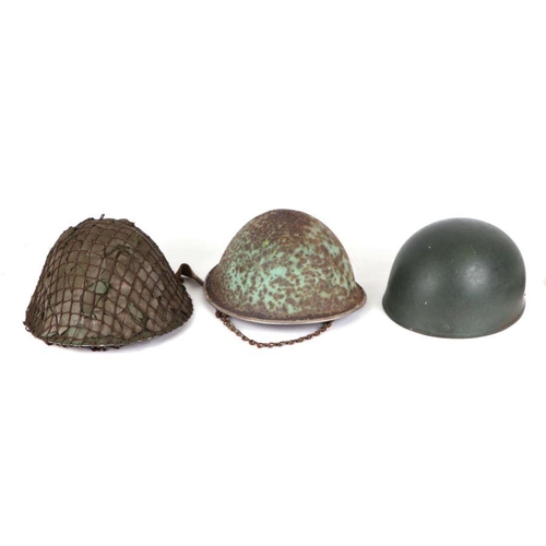 75 - A WWII despatch riders helmet together with two other helmets. (3)