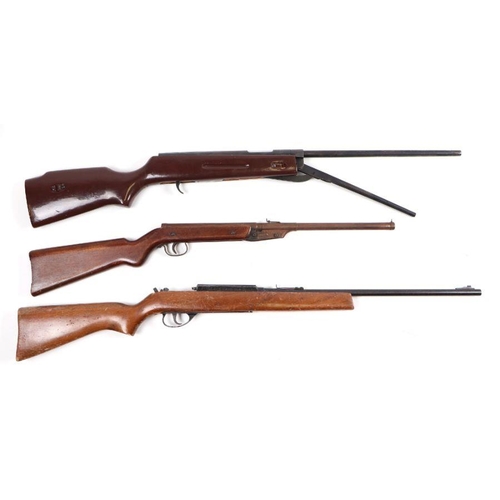 98 - A four-division fishing rod or gun wall hanging rack; together with three air rifles (4).