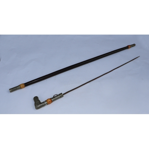 76 - A Middle Eastern metal mounted hardwood sword stick, overall 100cms long, blade length 58cms.