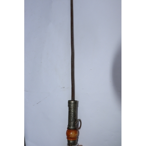 76 - A Middle Eastern metal mounted hardwood sword stick, overall 100cms long, blade length 58cms.