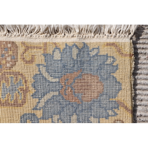 174 - A Tibetan saddle blanket; together with three Tibetan hand knotted meditation rugs, the largest 88 b... 