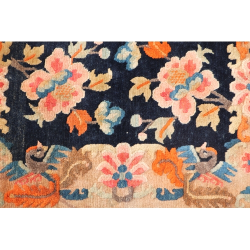 174 - A Tibetan saddle blanket; together with three Tibetan hand knotted meditation rugs, the largest 88 b... 