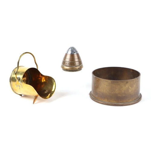 106 - A trench art miniature coal scuttle; together with an artillery shell fuse; and a mortar shell case ... 