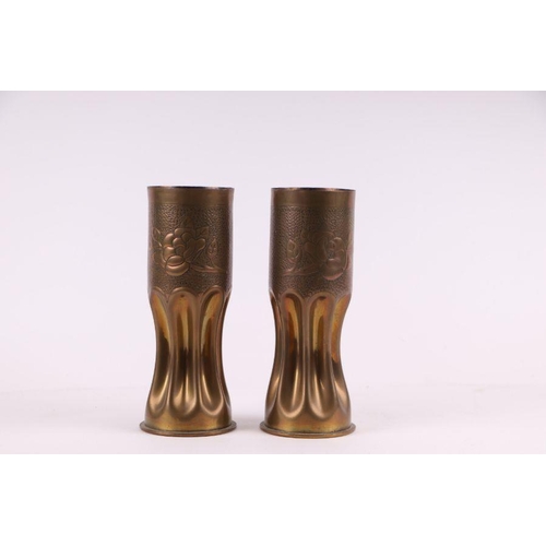 110 - A pair of WWI trench art brass shell cases (March 1917) modelled in the form of a pair of waisted va... 