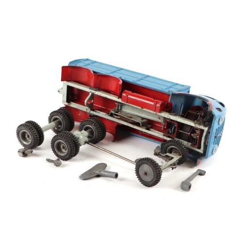 117 - A Shackleton Foden clockwork tipper lorry with blue cab and body with red chassis and accompanying t... 