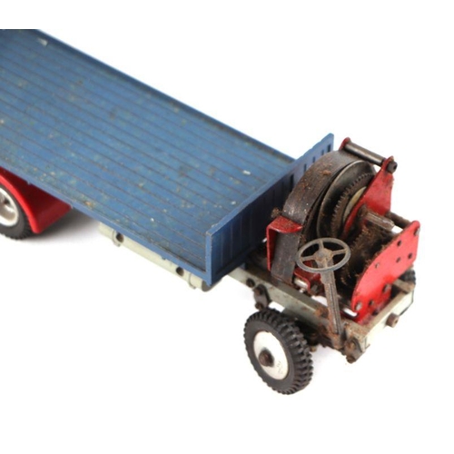 120 - A Shackleton Foden flatbed lorry with clockwork motor, blue cab and flatbed with red wings and chass... 