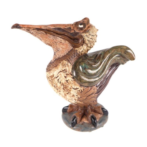 264 - A Burslem Pottery Martin Brothers style figure in the form of a pelican, by Andrew Hall, signed to t... 