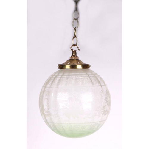 333 - A set of three etched glass ceiling globes, each 26cms high (3).