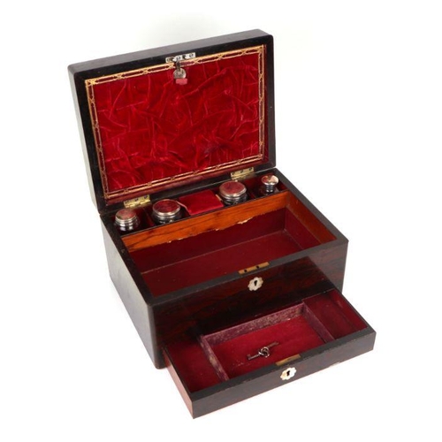 368 - A 19th century rosewood dressing box, the fitted interior with silver plated cosmetic jars and jewel... 