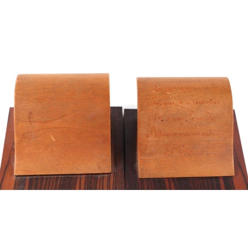 379 - Albert Chuput (20th century French) a pair of rosewood and beech sculptural bookends, 12.5cms high.