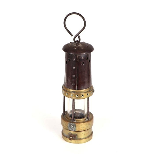 392 - An E Thomas & Williams Ltd Aberdare No. 42 Miner's lamp, 28cms high.