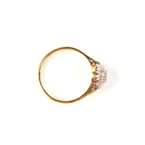 489 - An 18ct gold and diamond cluster ring, approx UK size 'M', 3g.