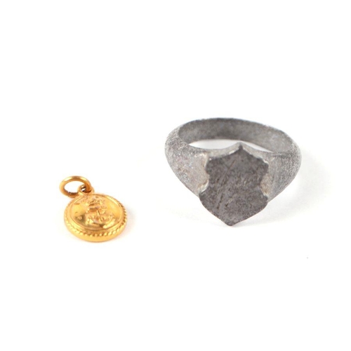 492 - A 9ct gold Fumsup charm; together with another 9ct gold charm, 1.2g; and an alloy signet ring (3).