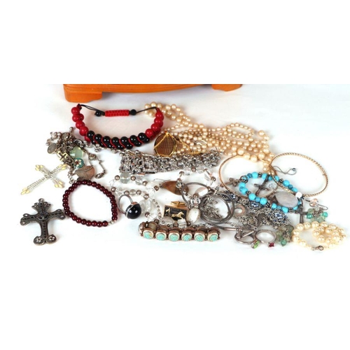 496 - A quantity of costume jewellery in a modern three-drawer jewellery chest.