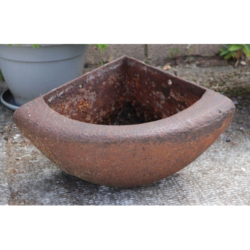 5 - A cast iron corner feeder / planter, 65cms wide.