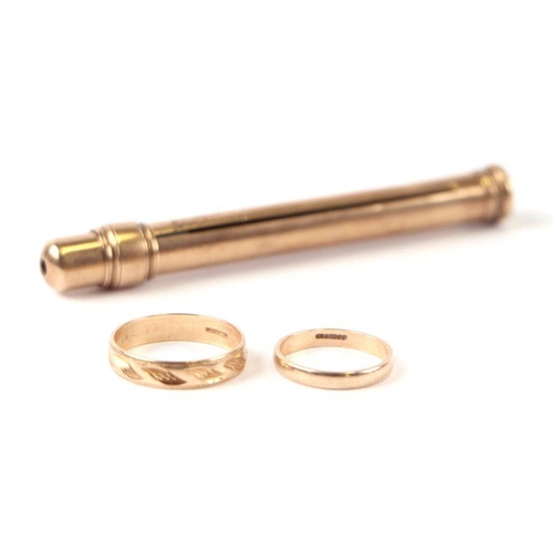 502 - Two 9ct gold wedding bands, 3.5g; together with a 9ct gold pencil, 10.6g (3).