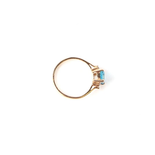 503 - A 9ct gold dress ring set with a rectangular blue stone and diamond set shoulders, approx UK size 'L... 