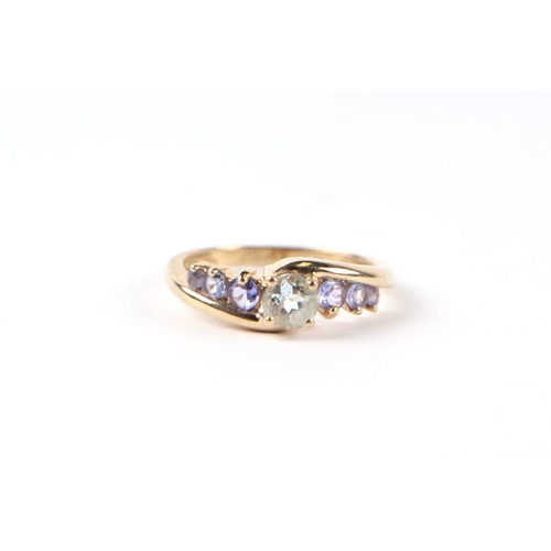 504 - A 9ct gold gem set dress ring, approx UK size 'N', 2.3g.